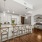 large, c-shaped kitchen next to study nook